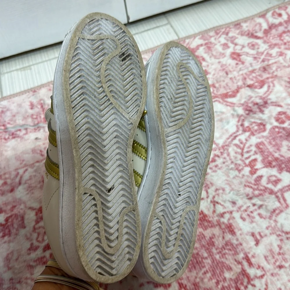 slip-on sneakers in a gorgeous brown, gold metallic and white colorway.